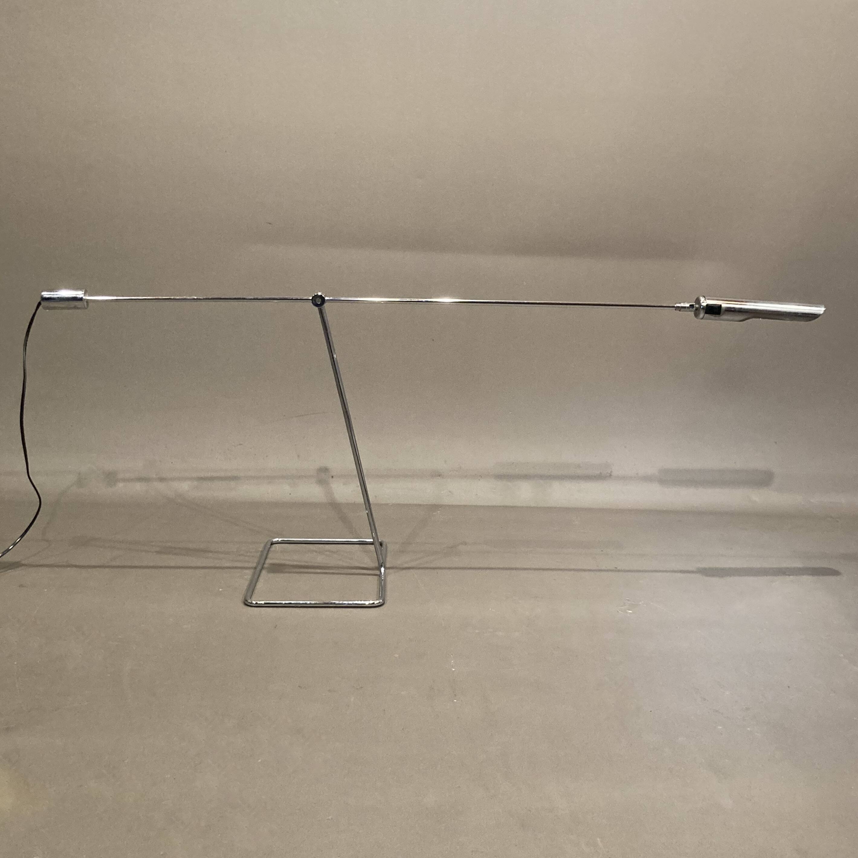 Large modular chrome lamp.