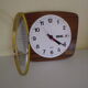 Formica wall clock with day and date - 1970s