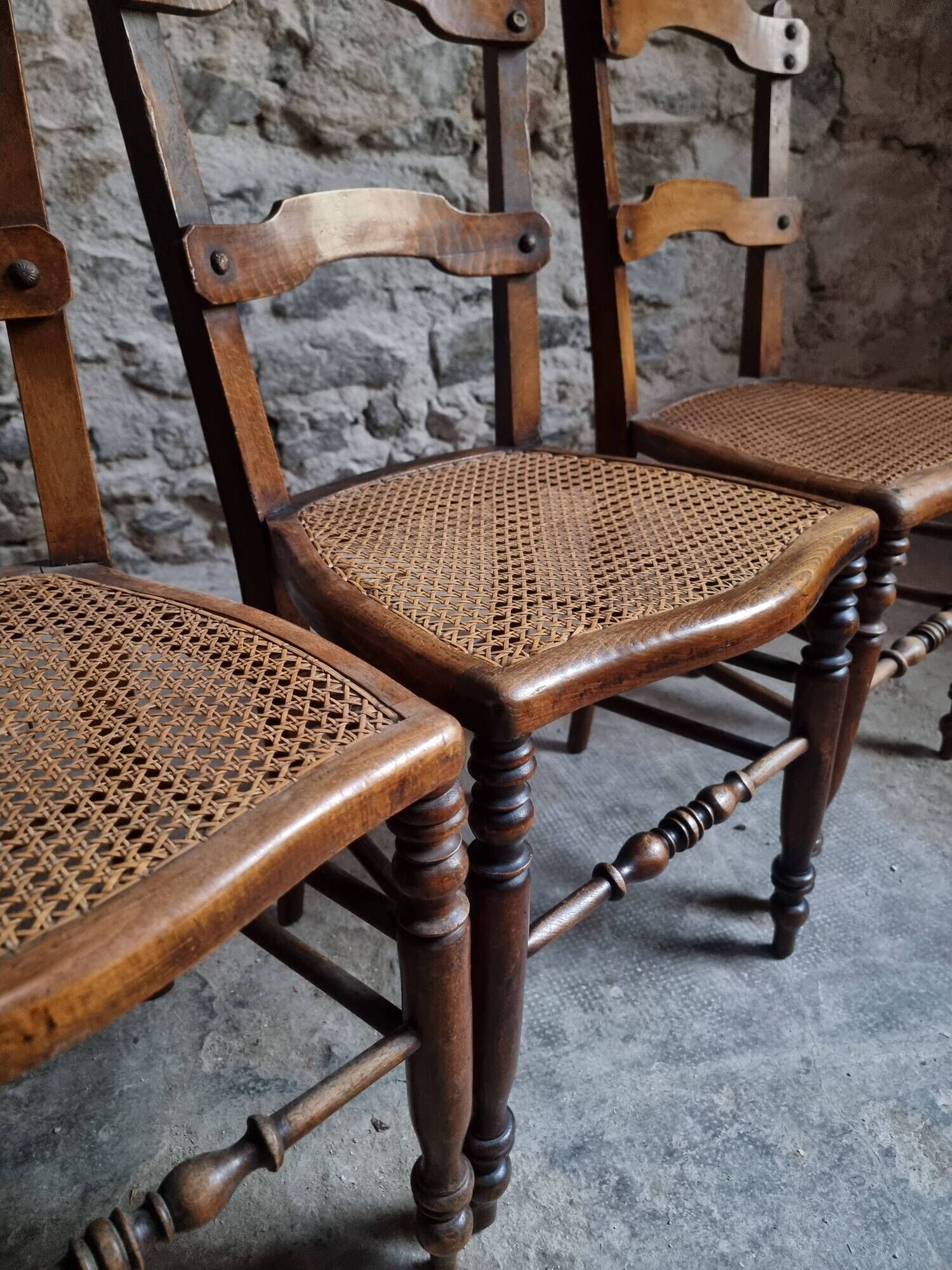 Set of 4 antique dining chairs with caned seats, beech, France, circa 1900–1920.