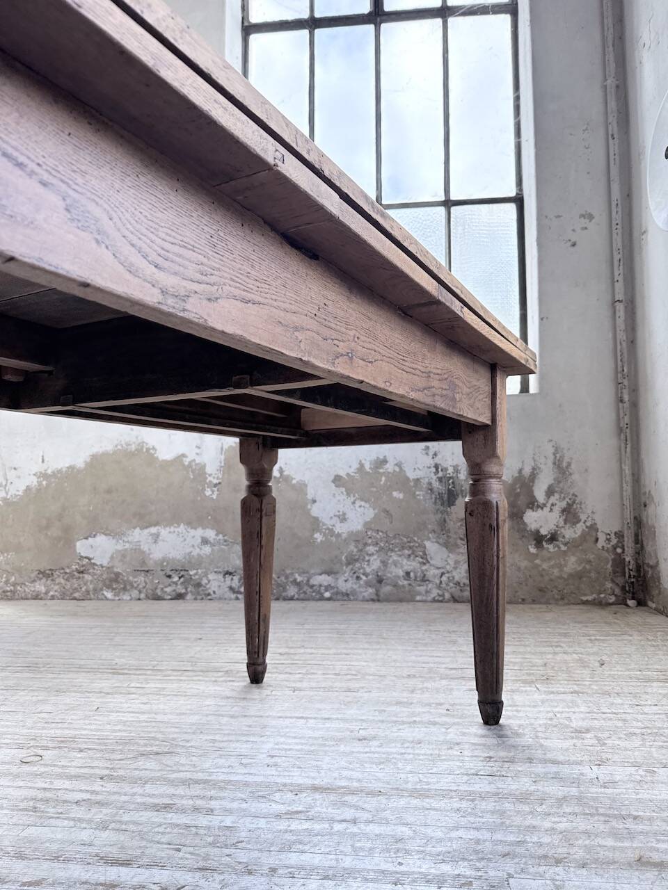 Solid oak farmhouse table with integrated extensions 1950