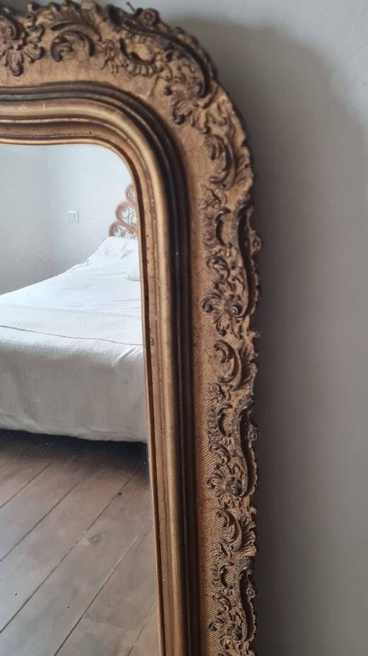 Antique Louis Philippe mirror with a pediment.