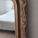 Antique Louis Philippe mirror with a pediment.