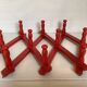 Red wood accordion coat rack