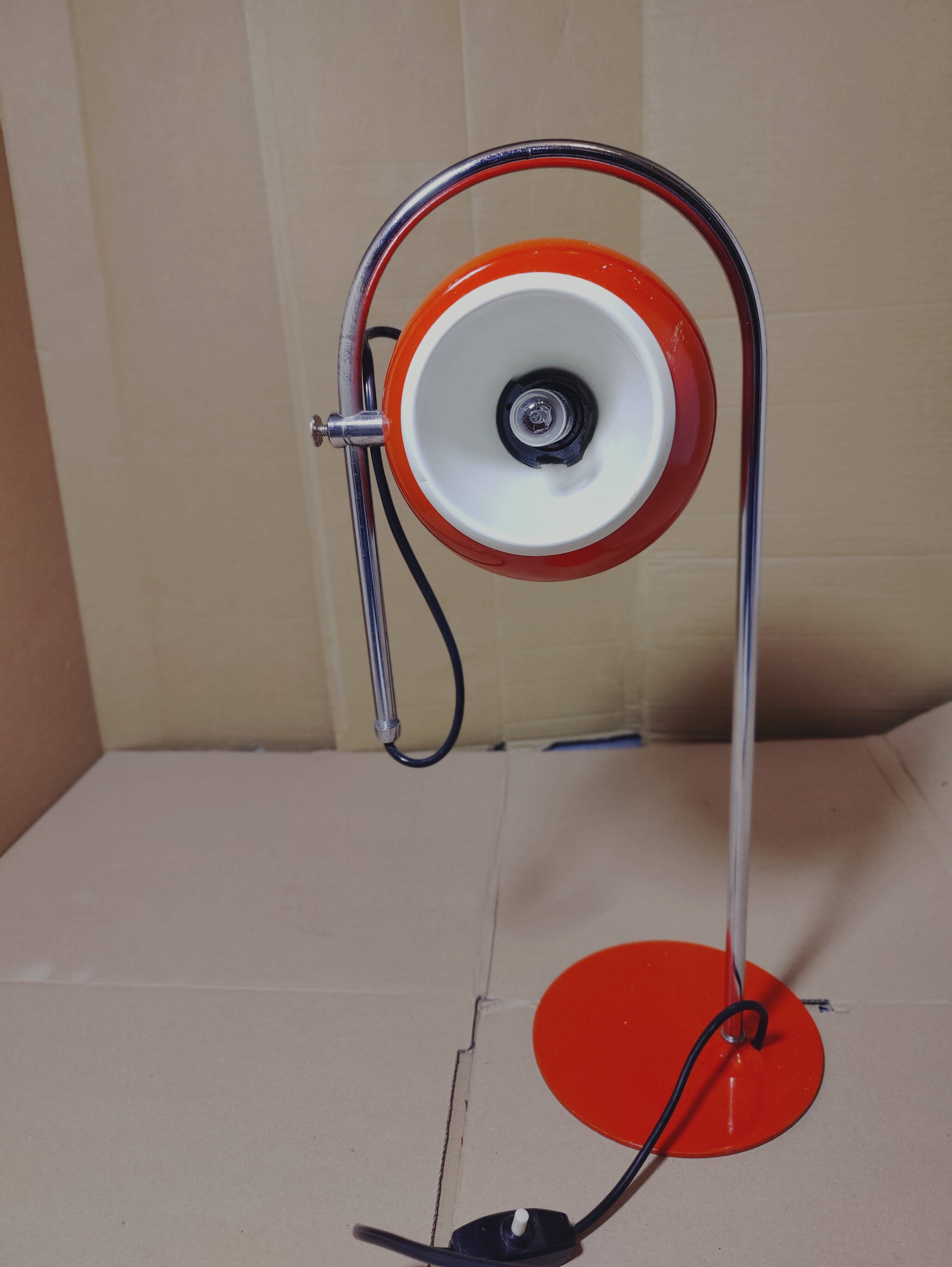 Eyeball space age orange desk or bedside lamp on an arc base
