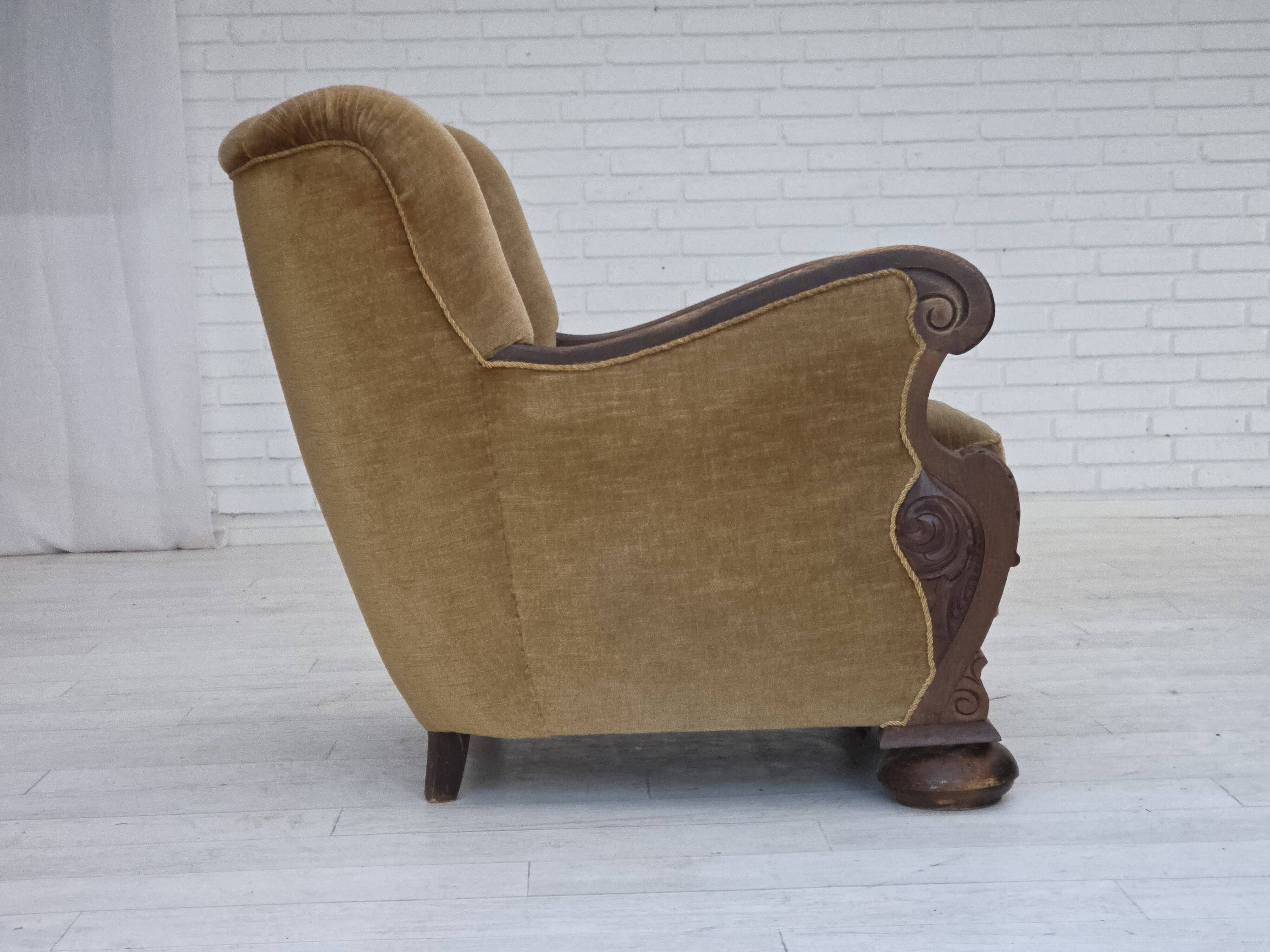 1960s, Danish armchair, original green furniture velour, carved oak wood.