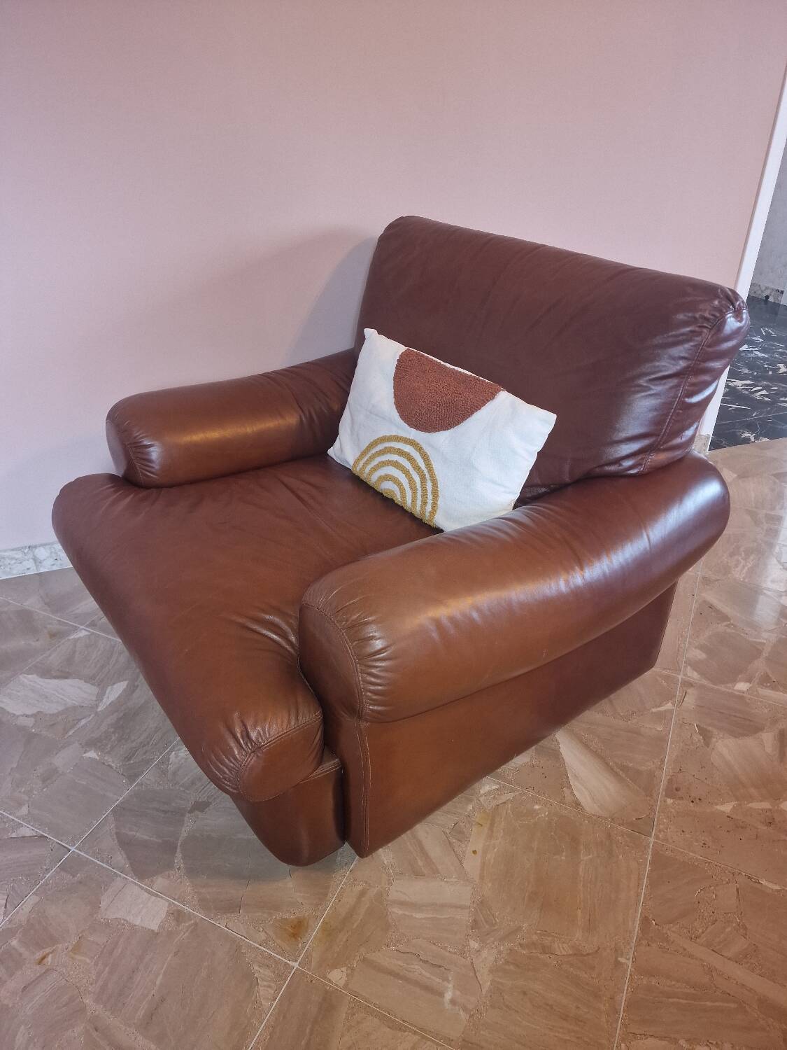 Vintage leather sofa and armchair