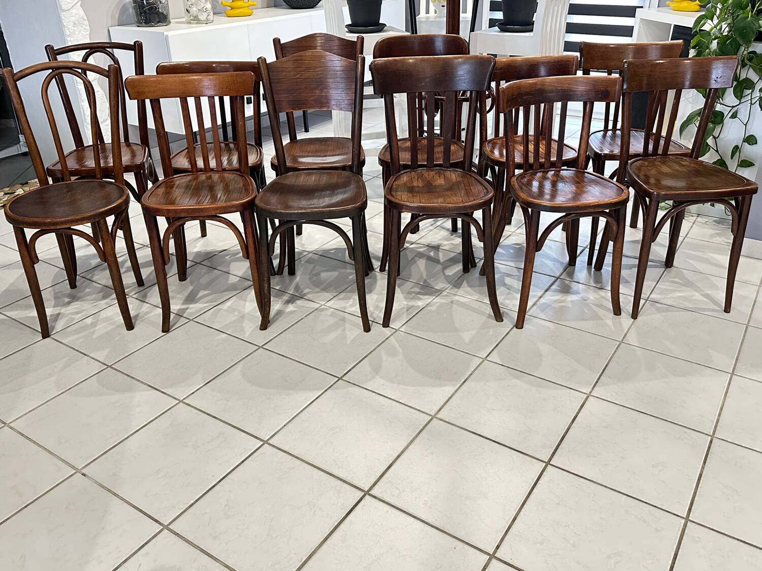 Set of 12 mismatched bistro chairs Baumann & Fischel 1930