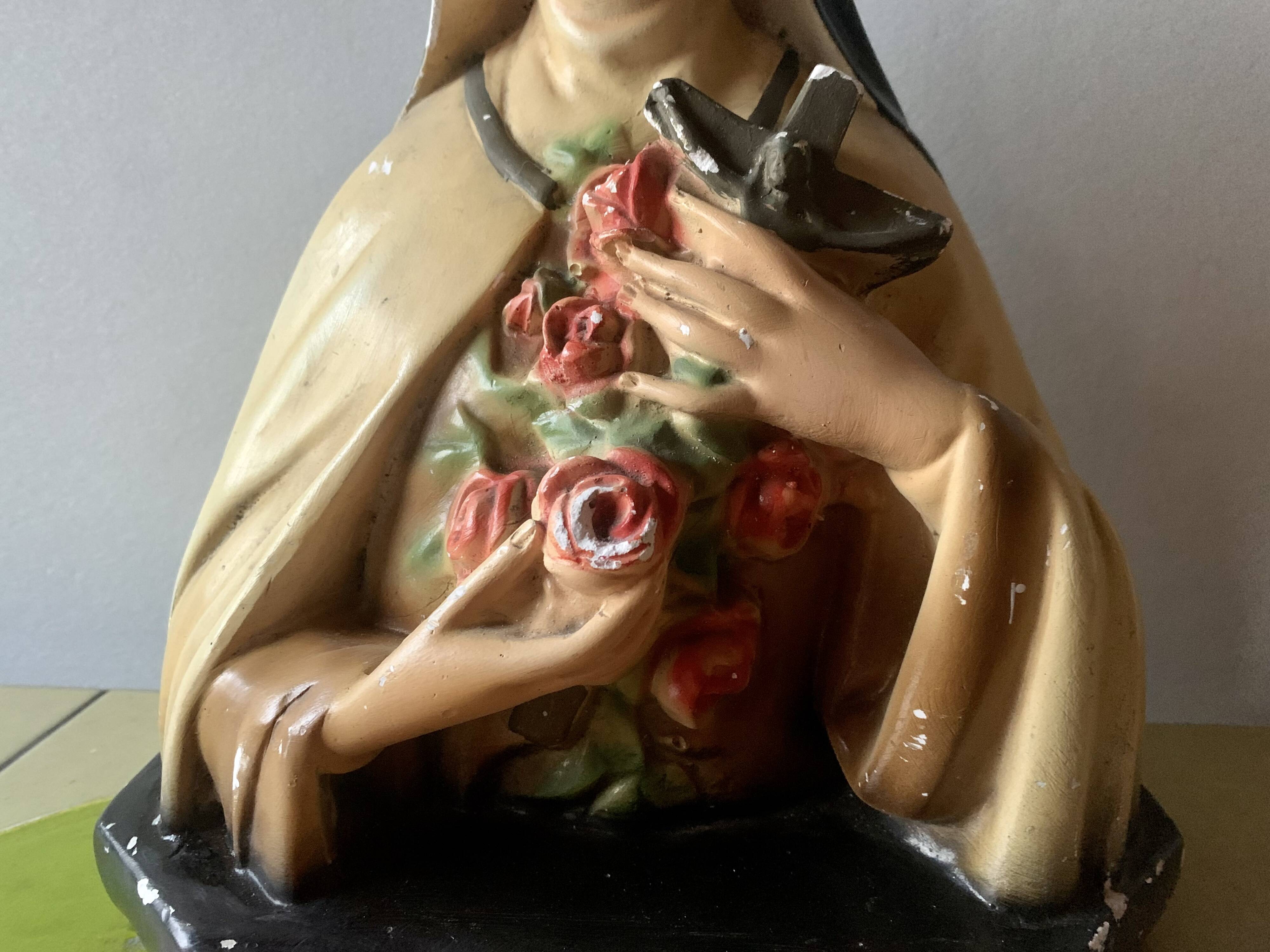 Old plaster bust of Saint Thérèse of Lisieux