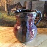 Signed varnished sandstone pitcher