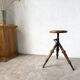 Tripod workshop stool in turned wood and cast iron — circa 1900