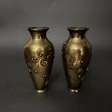 Pair of Japanese vases in chiselled bronze with inlaid bird decoration.