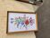 Embroidered tableau Kalocsa in multicolour on a white background, wooden and glass frame, vintage 1950s.