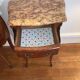 Lot of two rosewood and marble bedside tables