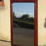 Large antique mirror in a flame mahogany frame; 132x82 cm