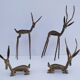 four vintage brass gazelle antelope sculptures