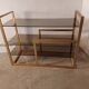Brass shelf, smoked glass