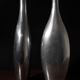Pair Of Polished Aluminum Tall Vases