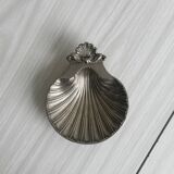 Silver metal shell emptier
