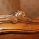Walnut rocaille bed from the early 20th century.