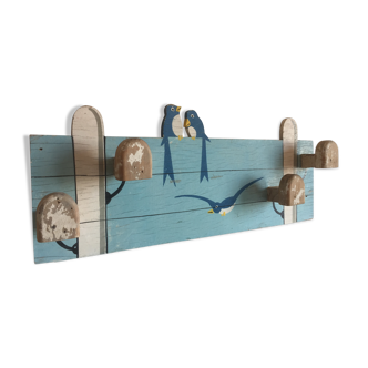 Coat rack with vintage swallows