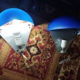 a pair of Ikea Kvintett wall lamps