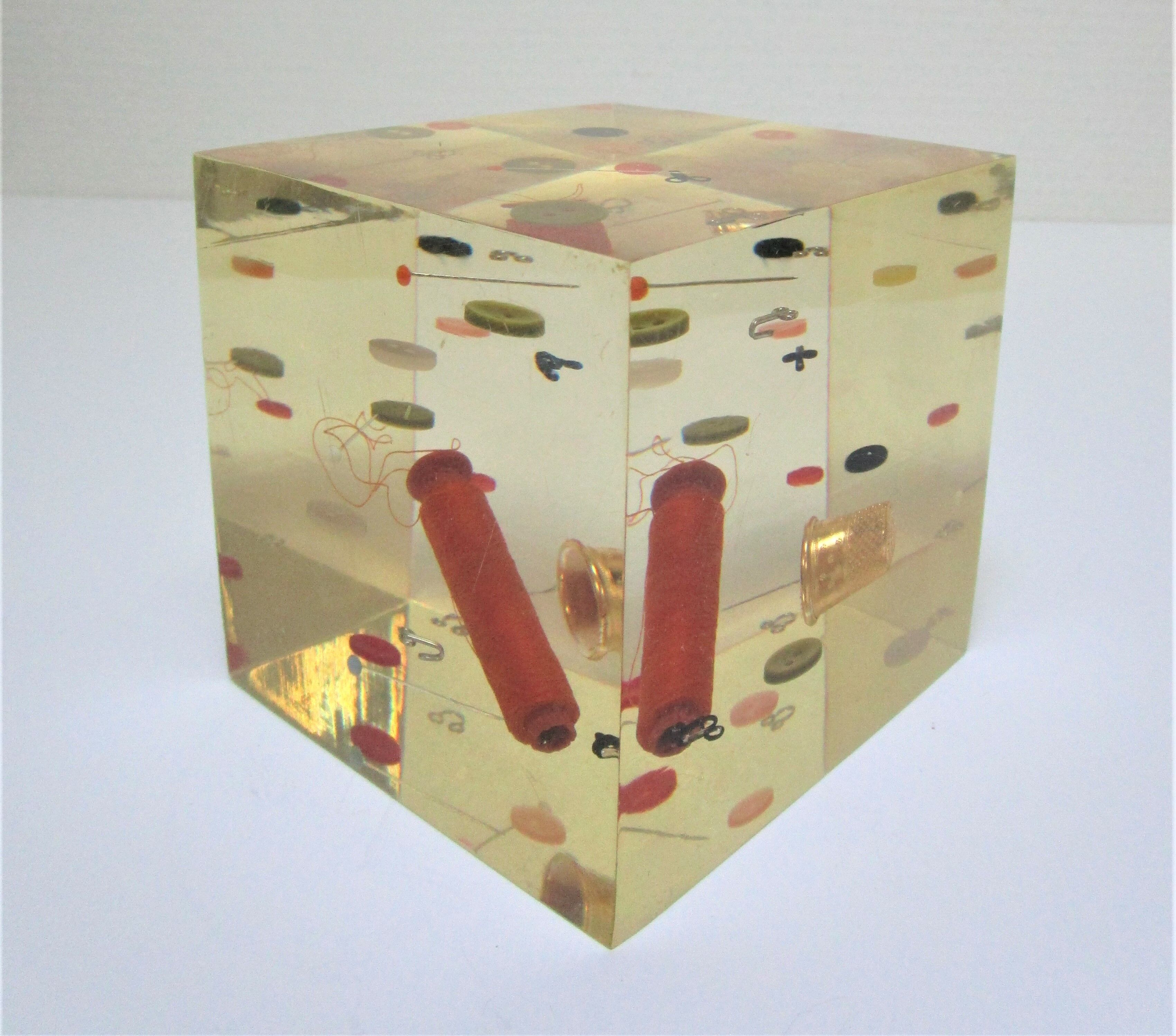 Paperweight sculpture block resin inclusions sewing design 70s