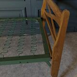 Bed with green metal braces 1960 a person foldable