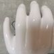 White ceramic hand wall lamp