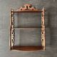 Napoleon III wall shelf in turned wood with a pediment.