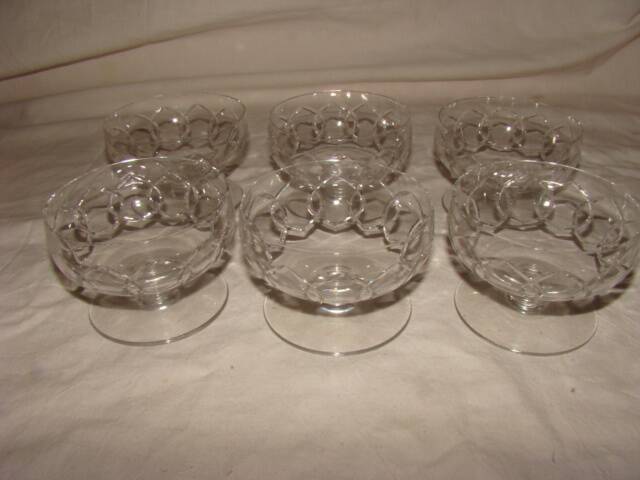 6 crystal champagne coupes from "Baccarat"