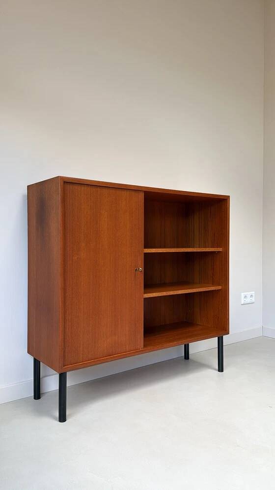 Vintage wooden cabinet with shelves and 1 door