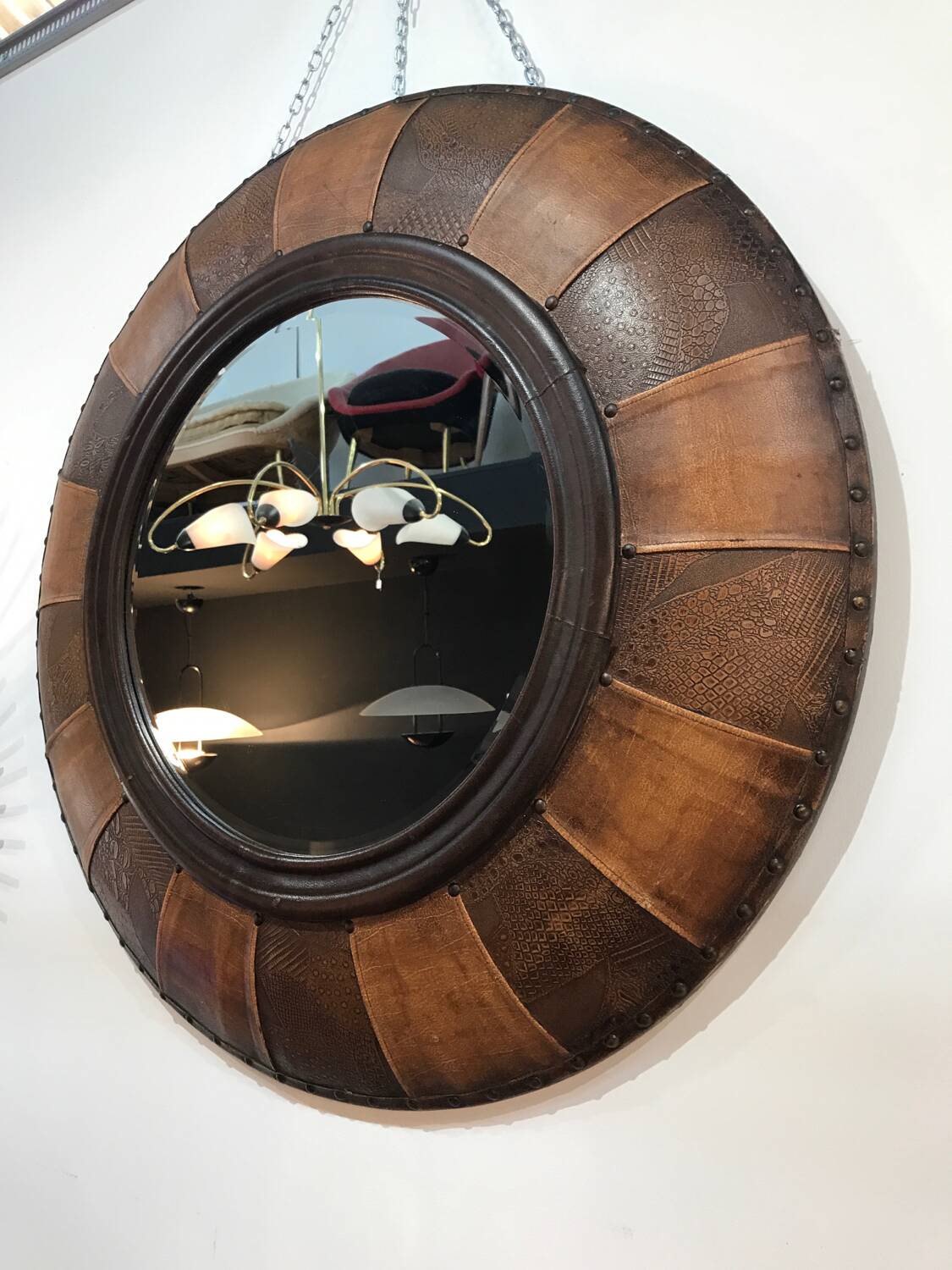 Large round leather mirror