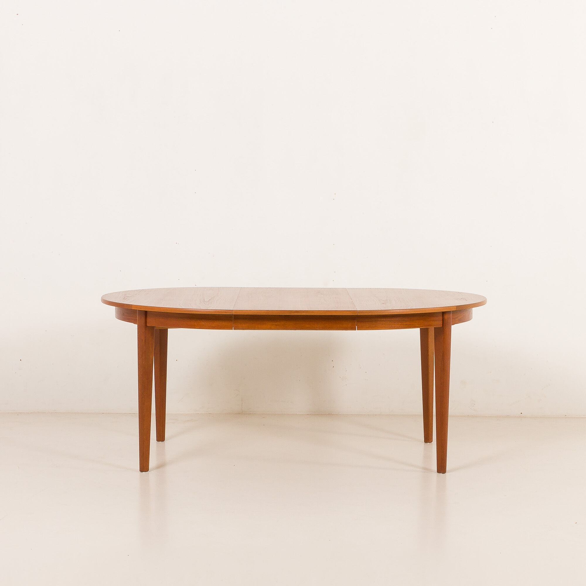 Henning Kjaernulf attributed extra large teak table with 4 inner leaves for Soro, Denmark 1960s