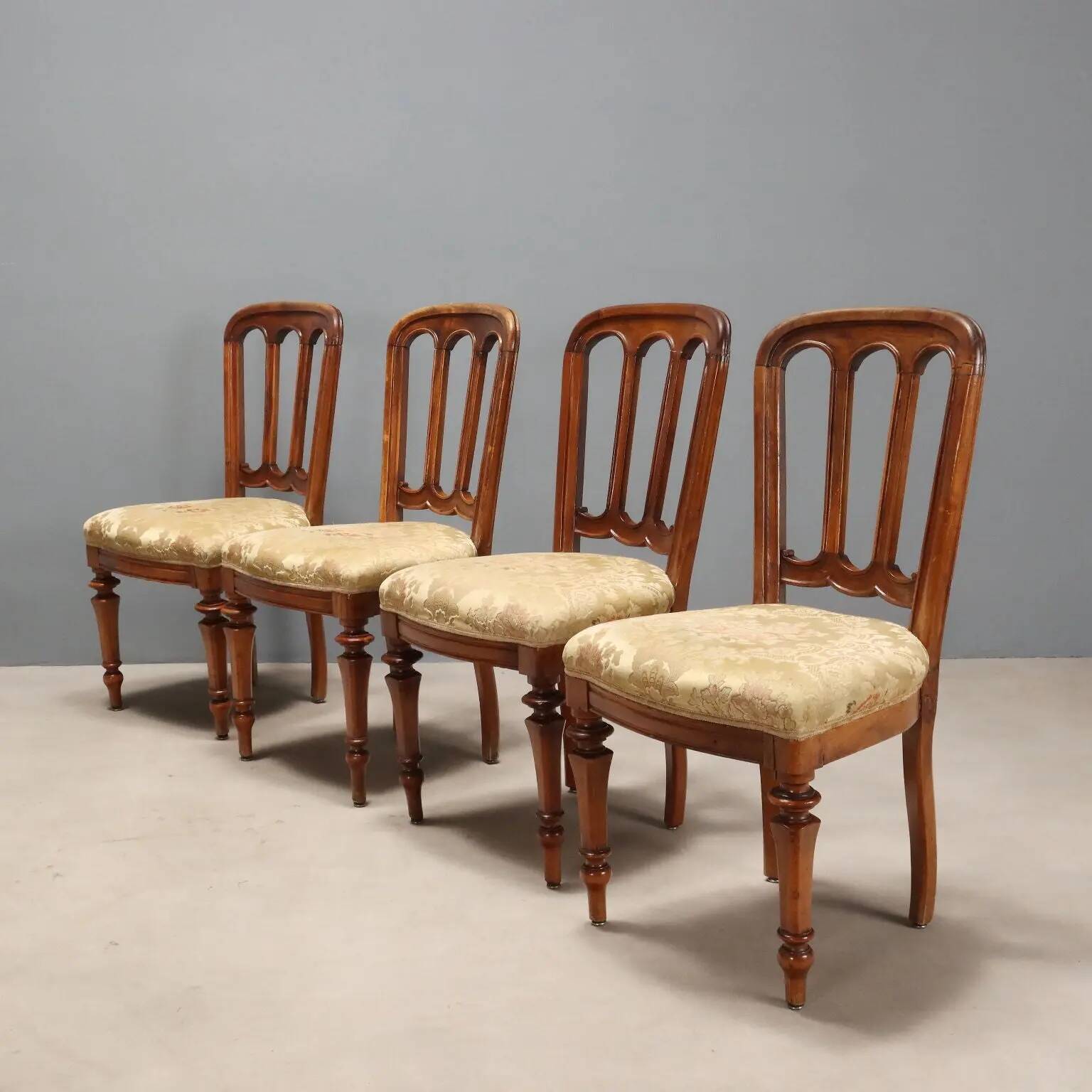 Antique walnut chairs with upholstered seats in fabric, Italy, late 19th century.