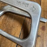 Repose pied design acier brossé Nelson Mobilier