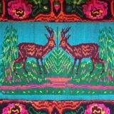 Vintage Romanian rug with deers, nature scenery on a floral background