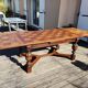 1910s Jacobean style solid oak extending drawer dining table