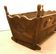 Sculpted walnut rocking cradle