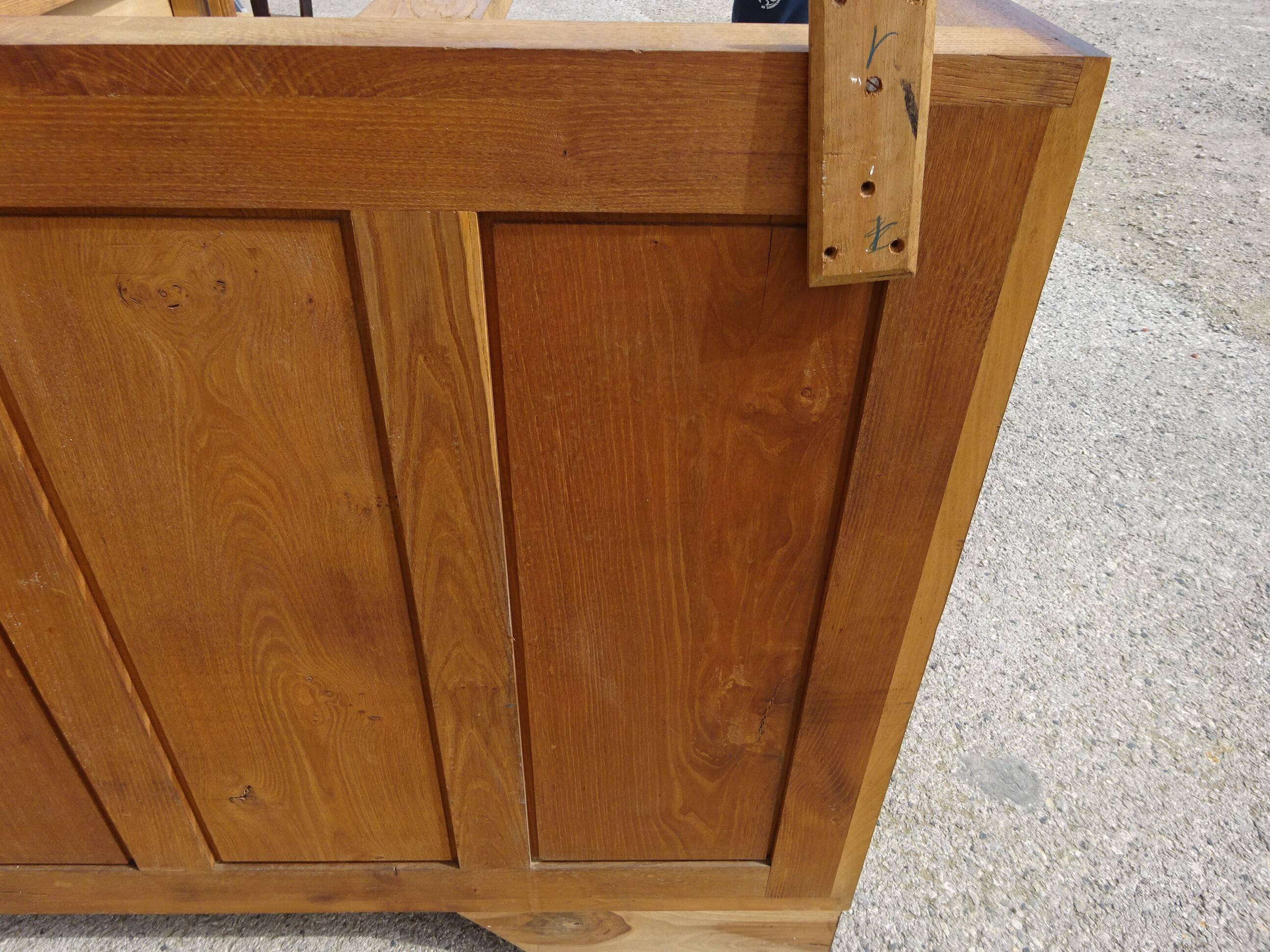 Solid walnut sideboard, moustache legs, black marble top.