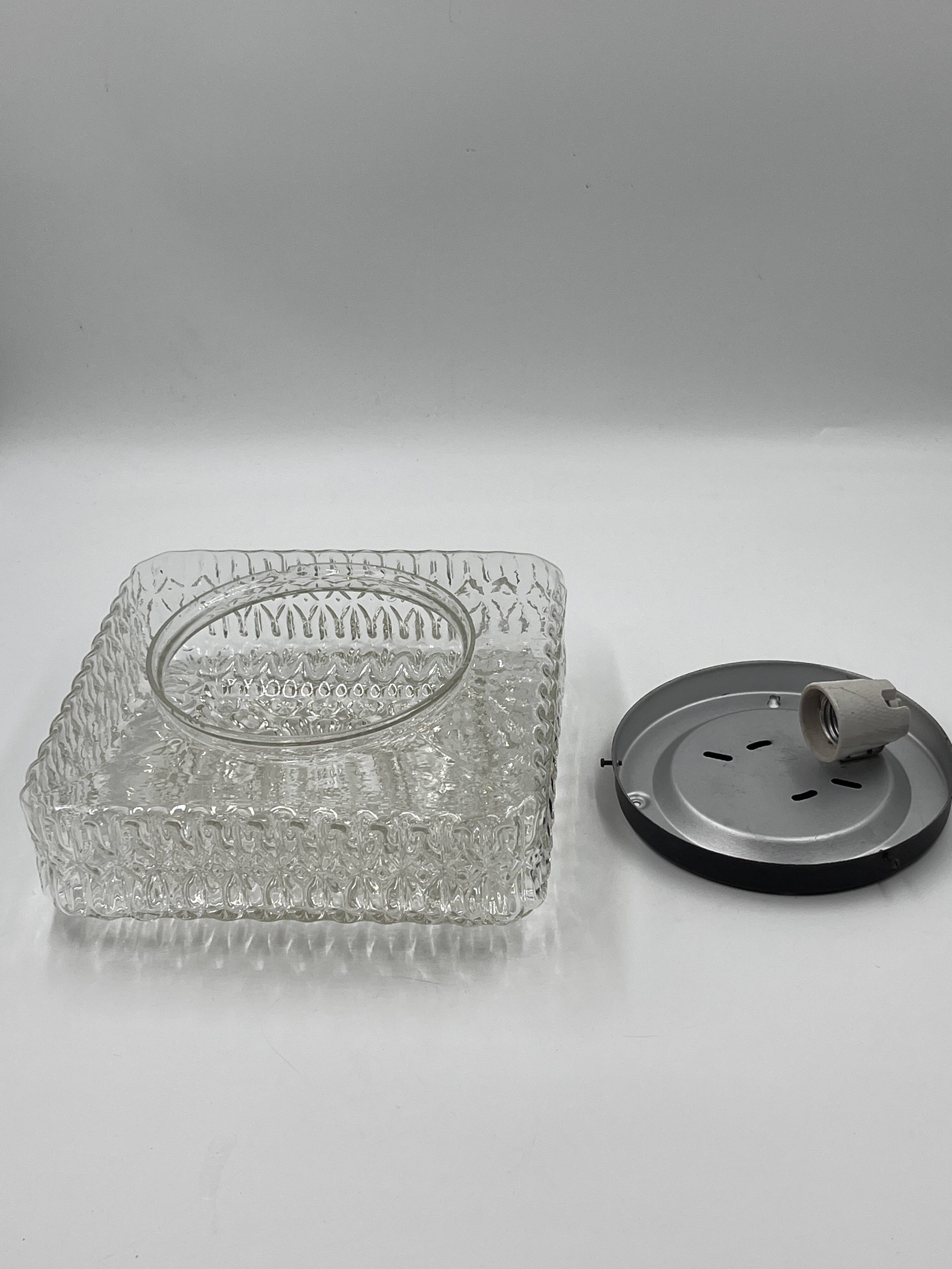 Square ceiling light in embossed molded glass