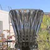 Table lamp with a crystal glass lampshade, like a vase and a golden base