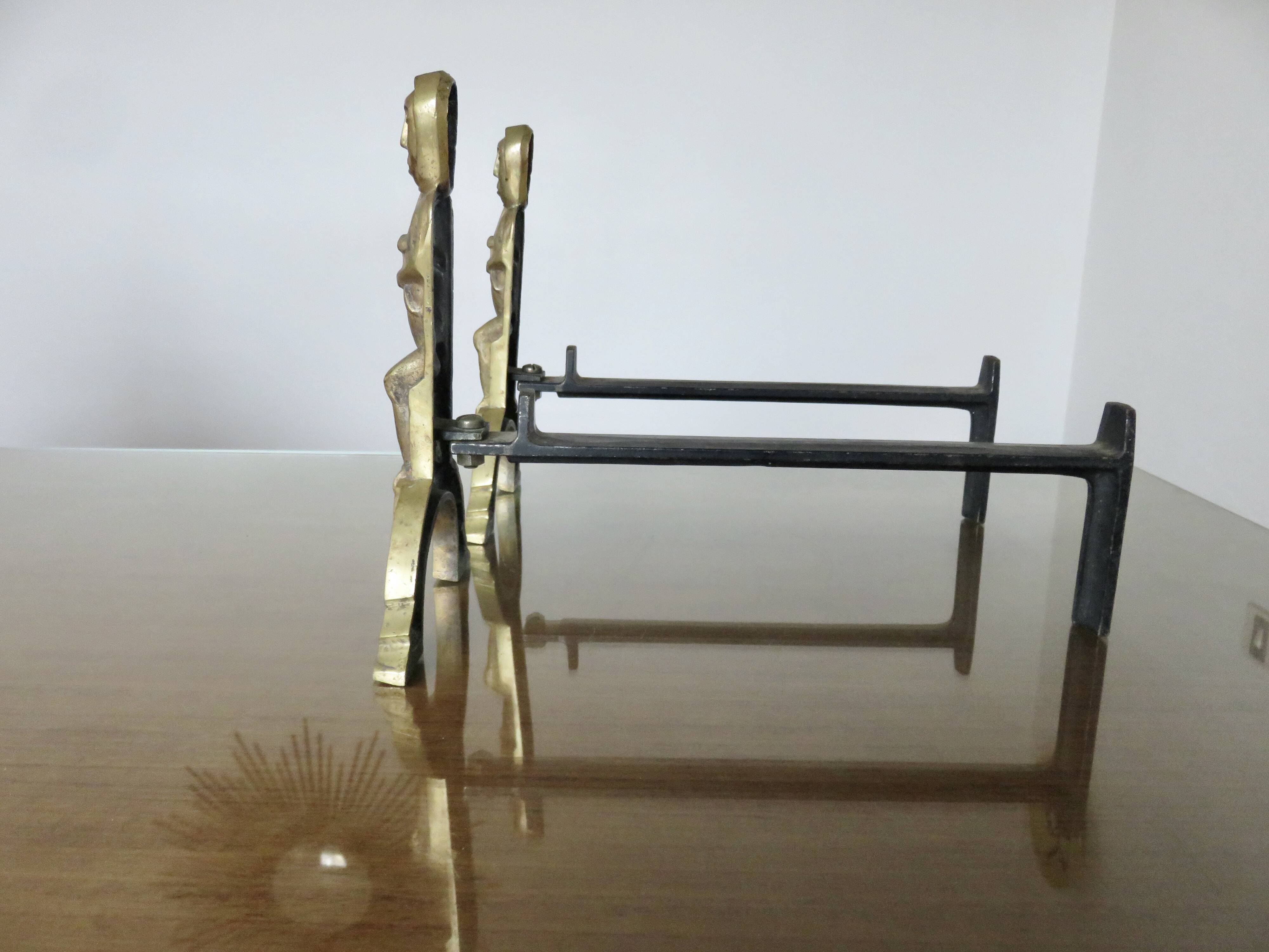 Anton Prinner, pair of Shaman fire dogs in gilded bronze, monogrammed, 1930