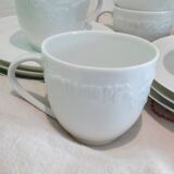 Set of 9 white porcelain coffee cups