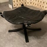Leather Falcon armchair and footrest