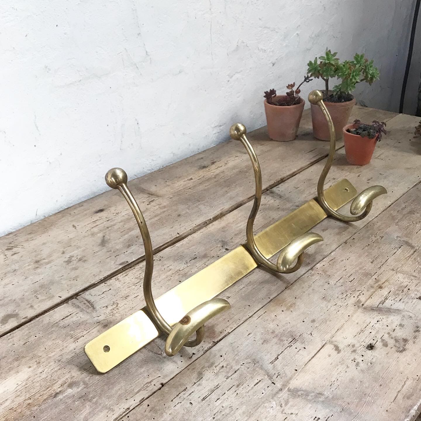 Brass wall coat rack