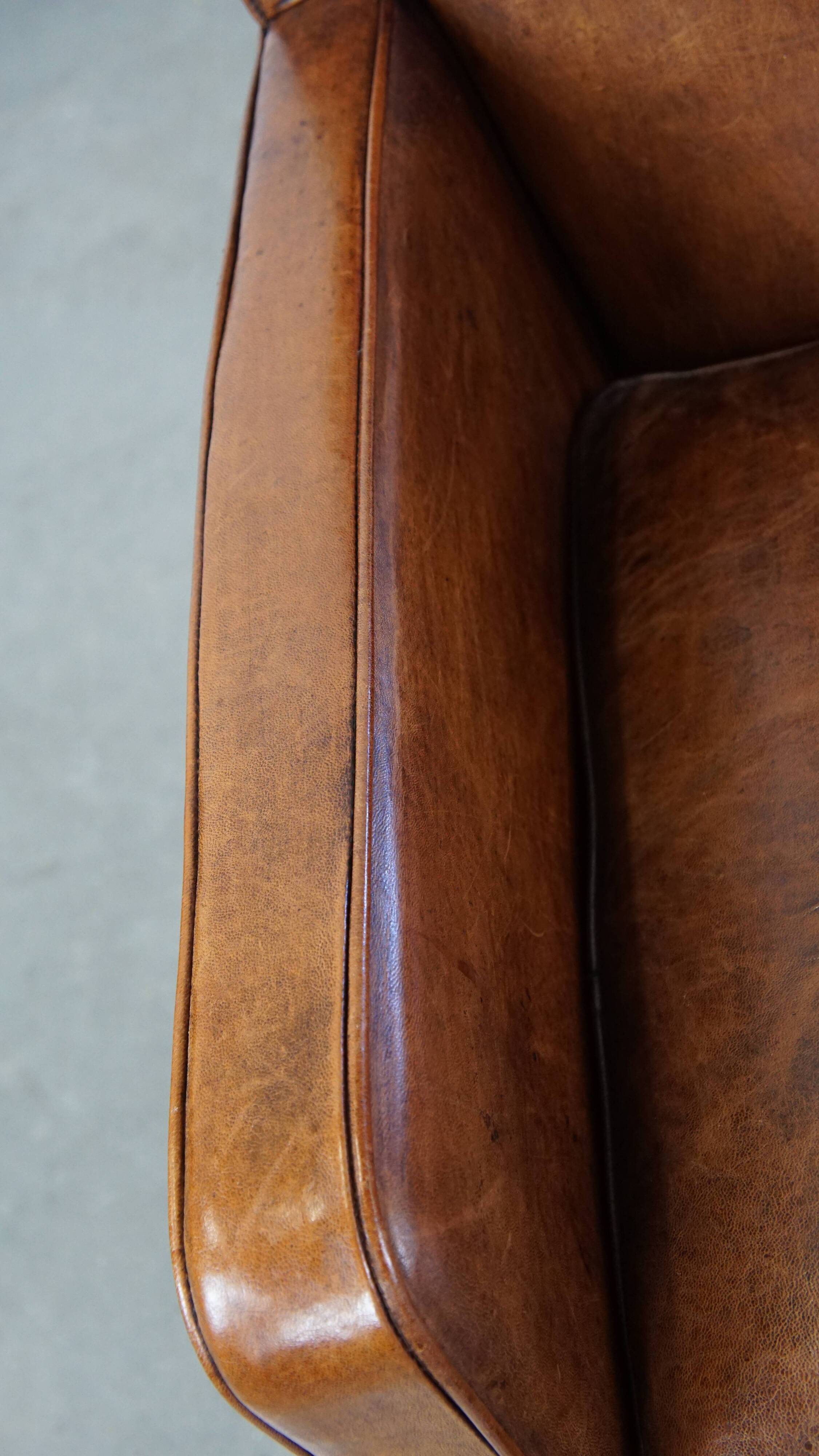 Sheepskin armchair with a refined Art Deco design