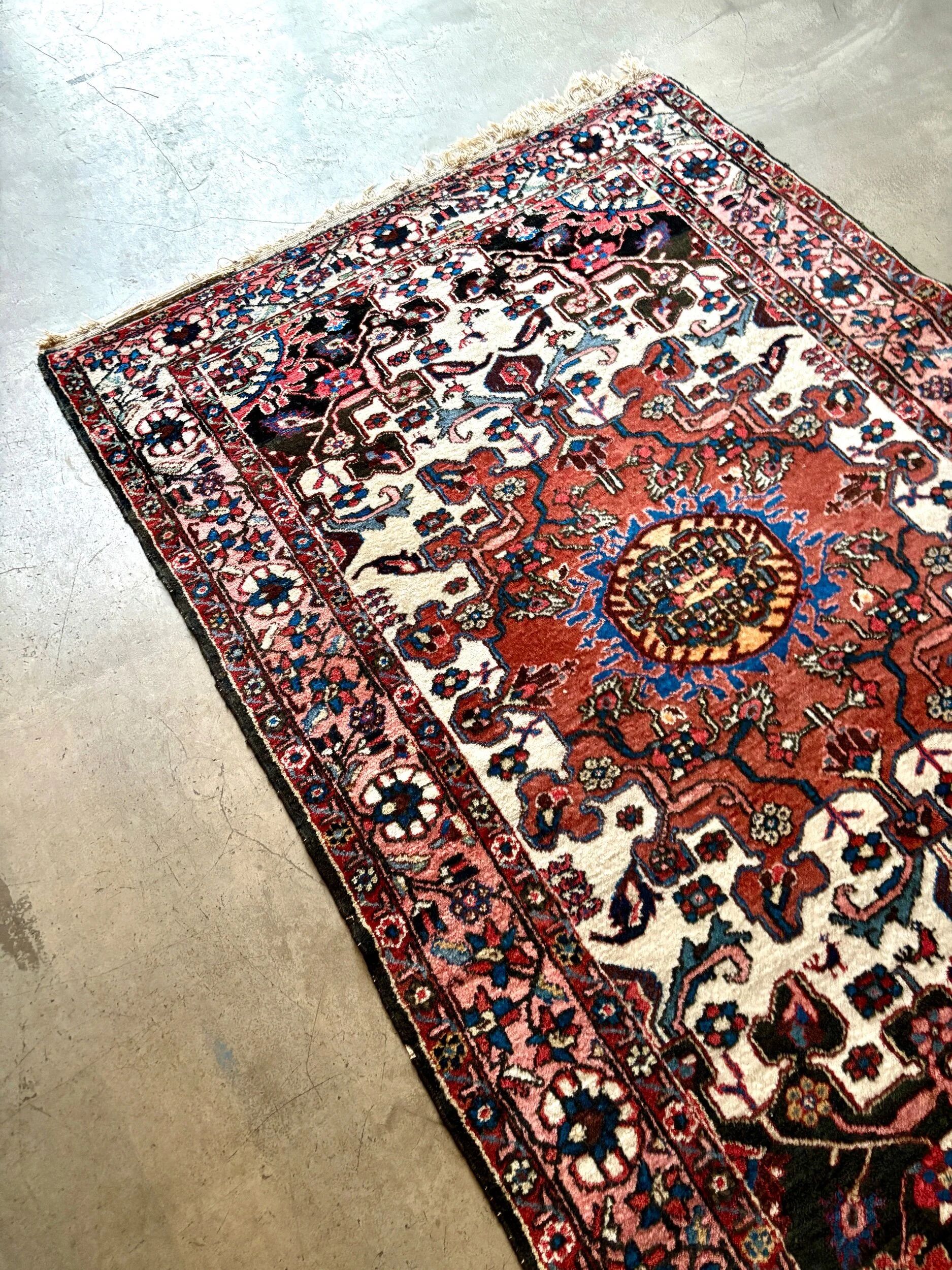 Persian carpet in wool and silk, old rose.