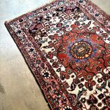 Persian carpet in wool and silk, old rose.