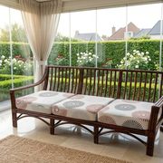 Vintage salon Maison Maugrion in rattan with leather and feather finishes.