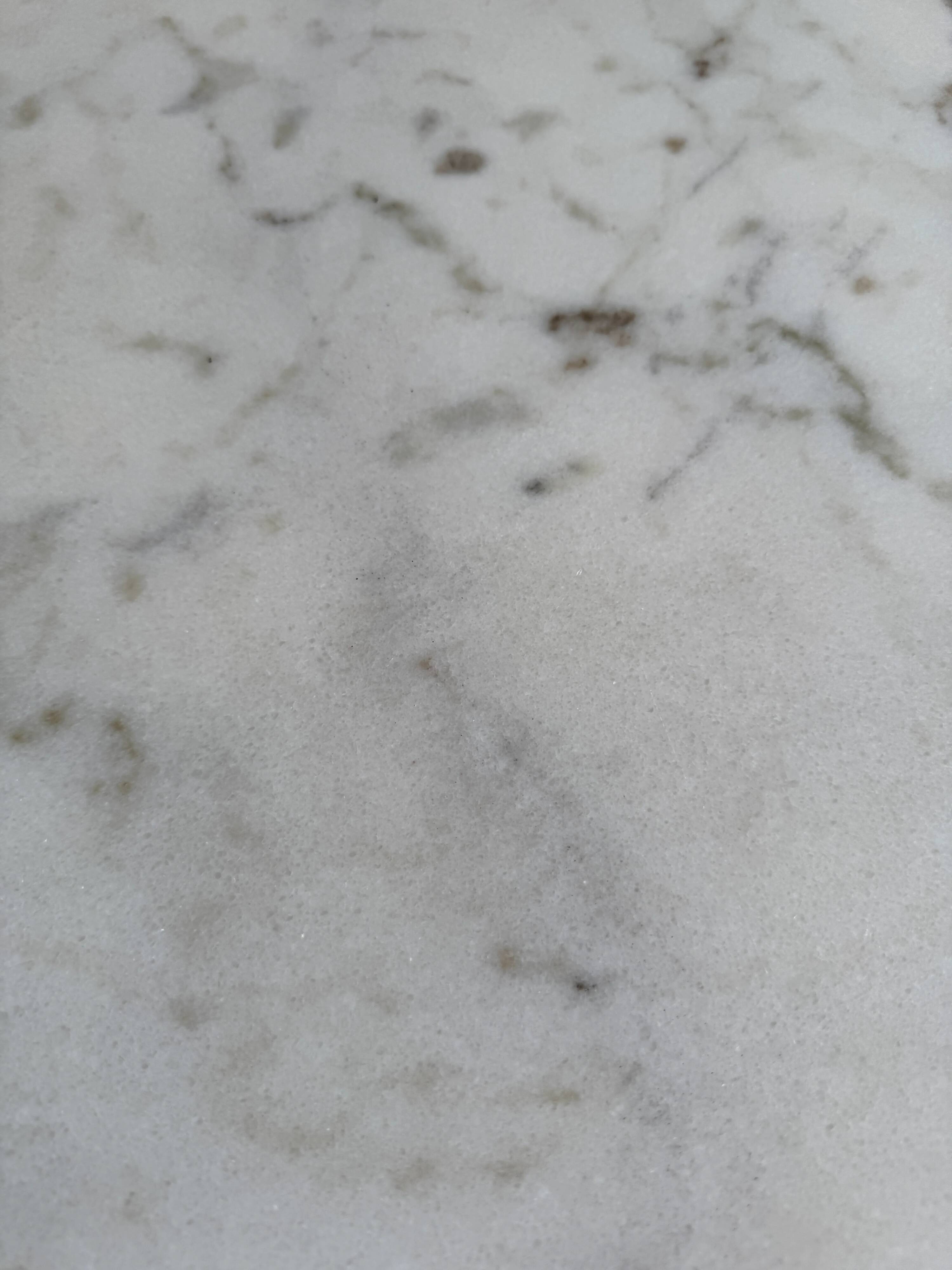 Unique postmodern coffee table in marble and granite.